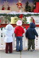 Kids at Christmas Display stock photo