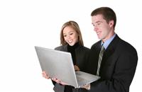 Young Business Team Holding Computer stock photo