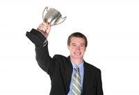 Business Man with Trophy stock photo