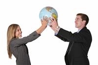 Business Team Holding Globe stock photo