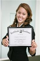 Business Woman with Certificate (focus on certificate) stock photo