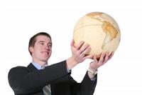 Business Man with Globe stock photo