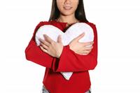 Woman Holding Heart stock photo