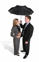 Attractive Couple Under Umbrella stock photo