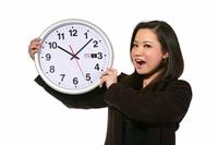 Woman with Clock stock photo
