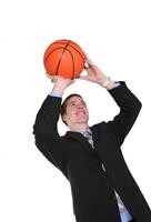 Business Man Playing Basketball stock photo