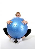 Woman and Exercise Ball stock photo