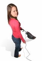 Pretty Woman Vacuuming stock photo
