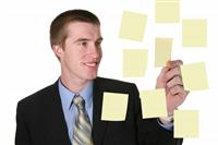 Business Man with Notes stock photo