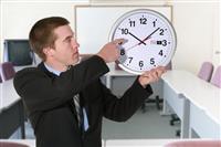 Business Man and Clock stock photo