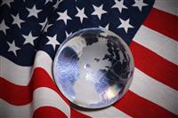Glass Globe over Flag stock photo