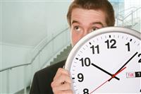 Business Man with Clock stock photo