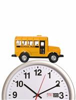 School Bus on Clock stock photo