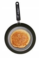 Pancake in pan stock photo