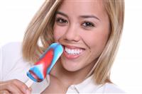 Woman Eating Popsicle stock photo
