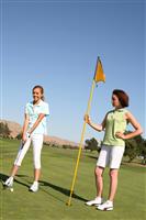 Women Golfing stock photo