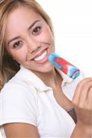 Woman Eating Popsicle stock photo