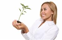 Pretty Woman and Growth Plant stock photo
