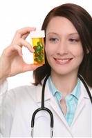 Pretty Nurse with Medication stock photo