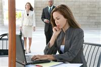 Business Woman on Computer stock photo