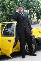 Business Man Exiting Taxi stock photo