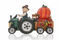 Scarecrow Driving Tractor stock photo