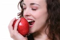 Woman Eating Apple stock photo