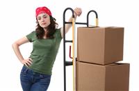 Woman with Moving Boxes stock photo