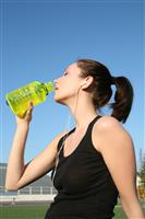 Woman Athlete Drinking stock photo
