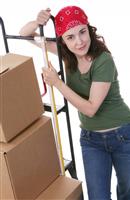 Woman with Moving Boxes stock photo