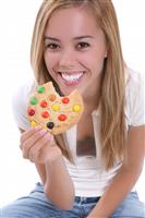 Girl Eating Cookie stock photo