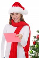Woman Giving Christmas Card stock photo