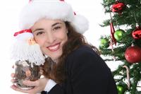 Christmas Woman with Money stock photo