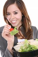 Woman Eating Salad stock photo