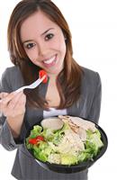 Woman Eating Salad stock photo