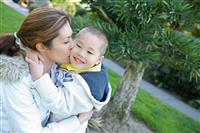 Mother and Son Kiss stock photo
