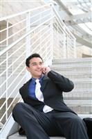 Business Man on Stairs with Phone stock photo