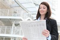 Business Woman Reading News stock photo