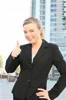 Pretty Business Woman with Thumbs Up stock photo
