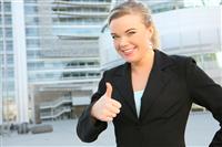 Pretty Business Woman with Thumbs Up stock photo