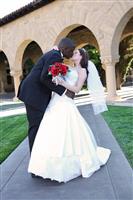 Attractive Interracial Wedding Couple Kissing stock photo