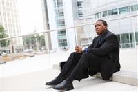 African Business Man Sitting at Office Building stock photo