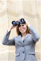 Business Woman with Binoculars stock photo