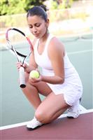 Pretty Woman Playing Tennis stock photo