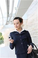 Asian Business Woman on Cell Phone stock photo
