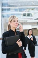 Pretty Blonde Business Woman on Cell Phone stock photo