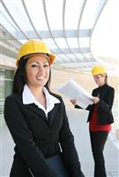 Pretty Women Architects on Construction Site stock photo