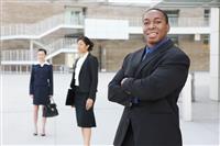 African American Business Man with Team stock photo