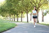 Pretty Woman Jogging in Park stock photo