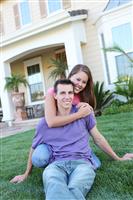 Couple in Love in Front of Home stock photo